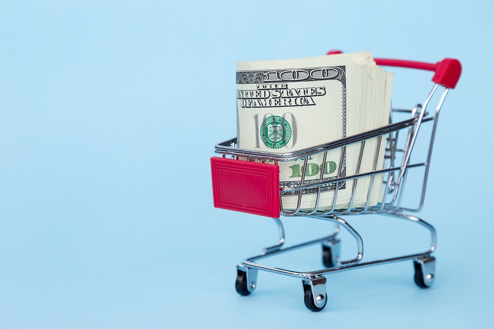 carrinho de compras com dólar dentro