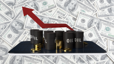 fundo de dólar e destacado a frente barris de petróleo com seta vermelha crescente, simulando os novos reajustes da Petrobras no preço do diesel, gasolina e gás de cozinha